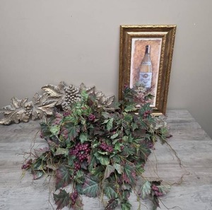 lot 393 image: Decorative Artificial Grape Vine Foliage Stems Bundle, Wooden Grapevine Wall Art, and Wine Bottle Framed Wall Art