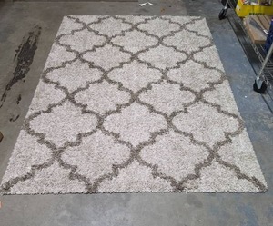 lot 417 image: Geometric Trellis Pattern Area Rug Beige Tan Gray 5 ft x 7 ft.  Good condition.