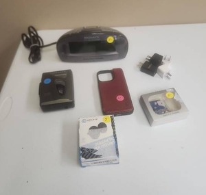 lot 546 image: Electronics Lot Magnavox MCR14017 Clock Radio, Panasonic Cassette Player, Phone Case, Charger