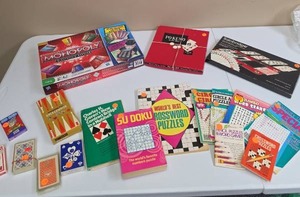 lot 582 image: Games & Puzzles Lot - Monopoly Electronic Banking, Backgammon, Playing Cards, Sudoku, Crossword & Word Search