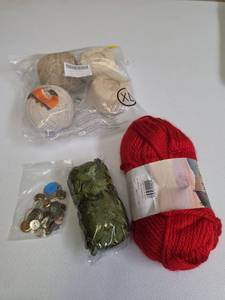lot 595 image: Craft Yarn and Notions Lot - Red Yarn, Leave strands, small bag of buttons, and crochet thread