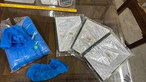 lot 643 image: 3 brand new Outdoor Furniture Covers 100% PEVA and a bag of Blue Disposable Shoe Covers