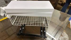 lot 647 image: Two Wood Laminate White Floating Shelves, one with a wire basket attached.  Includes bars for the floating shelves