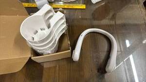 lot 648 image: Set of 4 brand new pool cup holders, and a neck fan