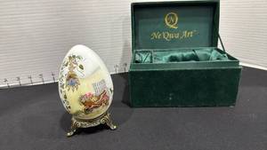 lot 1005 image: Peggy Abrams garden birdhouse porcelain egg signed with stand and box