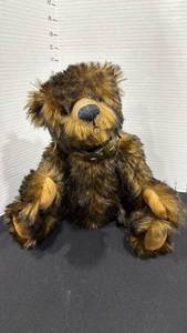 lot 1020 image: Mohair bear fully jointed with ultra suede paws 11 inches tall