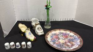 lot 1025 image: Norman Rockwell collectible thimbles, decorative shoes and plate with glass flowers