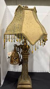 lot 1030 image: Elephant lamp with shade 31 inches tall