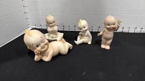 lot 1043 image: Porcelain Kewpie babies