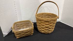 lot 1054 image: Longaberger baskets with plastic liners and handles