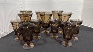 lot 1059 image: Fostoria Jamestown amber footed glasses set of 12