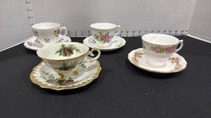 lot 1061 image: Royal Vale tea cups and saucers with pinecone tea set