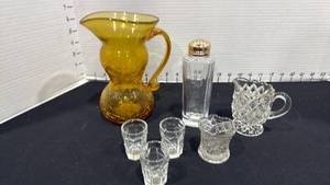 lot 1077 image: Crackle glass pitcher, salt shaker, cordials, toothpick holder with American Fostoria creamer
