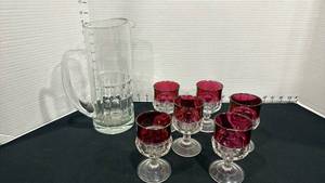 lot 1079 image: Tiffin Kings Crown ruby flash stemmed goblets and crystal pitcher