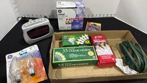 lot 1116 image: Times alarm clock, lightbulbs, extension cord and holiday lights