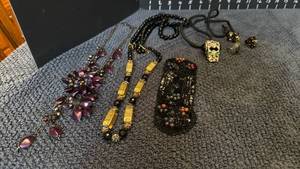 lot 1235 image: Womens jewelry including rings, jeweled whistle and patch