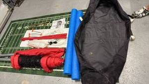 lot 2000 image: First Team Sports Inc. Apollo backyard full size volleyball net with rope, stakes and carrying case, retails for $399 new in pkg