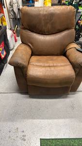 lot 2001 image: La-Z-Boy leather rockerrecliner, massage and heat works 40x36x36 address for pickup will be supplied to winner on day of pickup (back can be removed for easier transport)