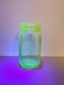 lot 41 image: 1930s Uranium Vaseline Glass Jar with Ribbed Pattern