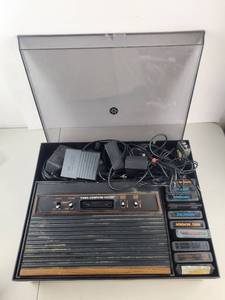 lot 50 image: Atari 2600 Video Computer System with Games and Accessories