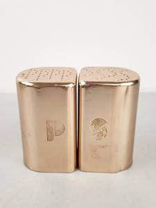 lot 113 image: Vintage MCM Pink Anodized Aluminum Salt and Pepper Shakers