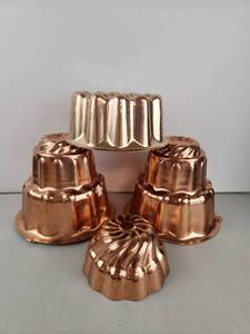 lot 119 image: Lot of Vintage Copper-Tone Baking Molds 4-Piece Set Fluted Crown Swirl