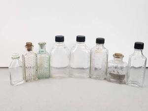 lot 131 image: Lot of 8 Vintage to Now Glass Pharmacy Bottles with Caps and Corks