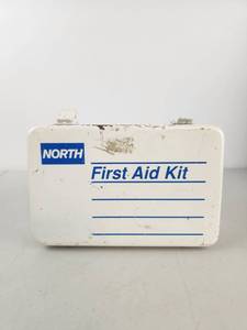 lot 278 image: Vintage North First Aid Kit with Bandages and Gauze Compresses