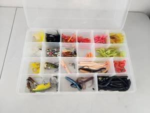 lot 301 image: Fishing Lure and Tackle Assortment Box with Plugs, Skirts, and Hooks