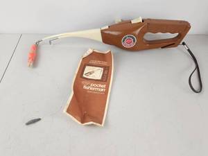 lot 307 image: Vintage Pocket Fisherman