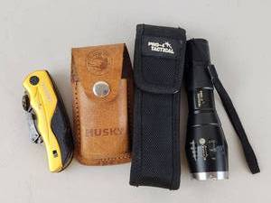 lot 313 image: Husky Folding Knife Yellow with Sheath, Flashlight and Accessories Lot