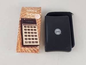 lot 324 image: Texas Instruments TI-1050 Calculator with Palmtop Keyboard and Carrying Case