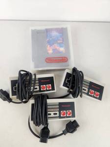 lot 345 image: Nintendo NES Lot Tetris Game with 3 Controllers