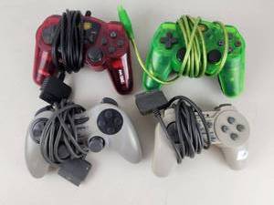 lot 348 image: PlayStation DualShock Controller Lot 4 Units Gray Red Green White