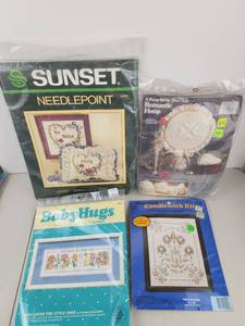 lot 426 image: Lot of 4 Craft Kits Sunset Needlepoint, Yours Truly Hoop, Creative Moments Candlewick, Baby Hugs
