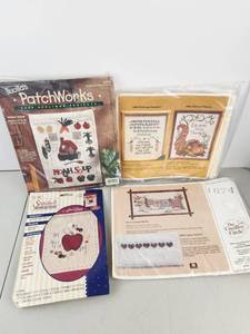 lot 428 image: Lot of 4 Embroidery & Needlecraft Kits - Bucilla PatchWorks, Plaid Stitched Impressions, Cross Stitch Projects