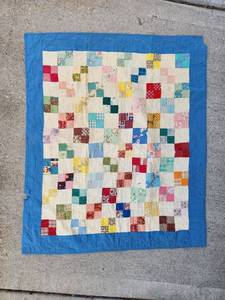 lot 460 image: Vintage Baby Patchwork Quilt with Blue Border and Quilted Back 40x36