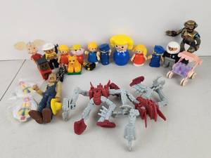 lot 498 image: VIntage Toy Figure Lot Including Dolls Robots Transformers and Accessories