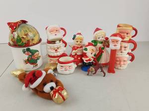 lot 543 image: Vintage Christmas Lot Mini Santa Mugs Looney Tunes Ornament & More