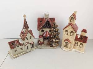 lot 561 image: Ceramic Holiday Village Houses 3-Piece Lot Tea Light Holders