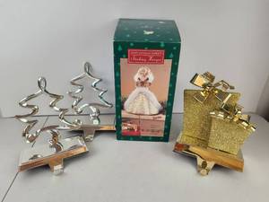 lot 581 image: Lot of Christmas Stocking Hangers Barbie in Box Gold Gifts Silver Tree