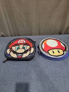 lot 805 image: Nintendo Super Mario Mario and Mushroom Neoprene Cases Lot of 2