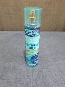 lot 831 image: SPA Luxury Passionfruit Escape Scent Body Mist 7 FL oz