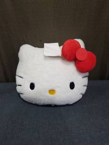 lot 840 image: Hello Kitty Weighted Vibrating Massage Pillow, Battery Powered Back Of Pillow has Pink Tint See Pictures