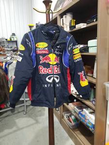 lot 858 image: Red Bull Racing Team Jacket with Infiniti, Geox, Total, Rauch, Pirelli Logos Size XS