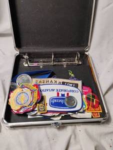 lot 34471 image: Case full of aircraft badges