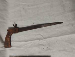 lot 34380 image: Wood Handle flooring trowel, Old Hand saw and a tow hitch