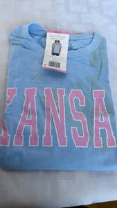 lot 781 image: Graphic State Tee Size Small Light Blue with Pink Lettering (Stain on it )