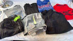 lot 795 image: Kids Athletic Clothing Lot of 7 Under Armour Nike Kansas Jayhawks Used