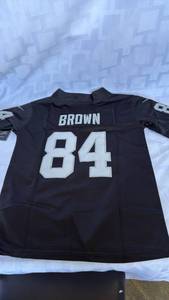 lot 807 image: Nike NFL On Field Football Jersey Size S Brown 84